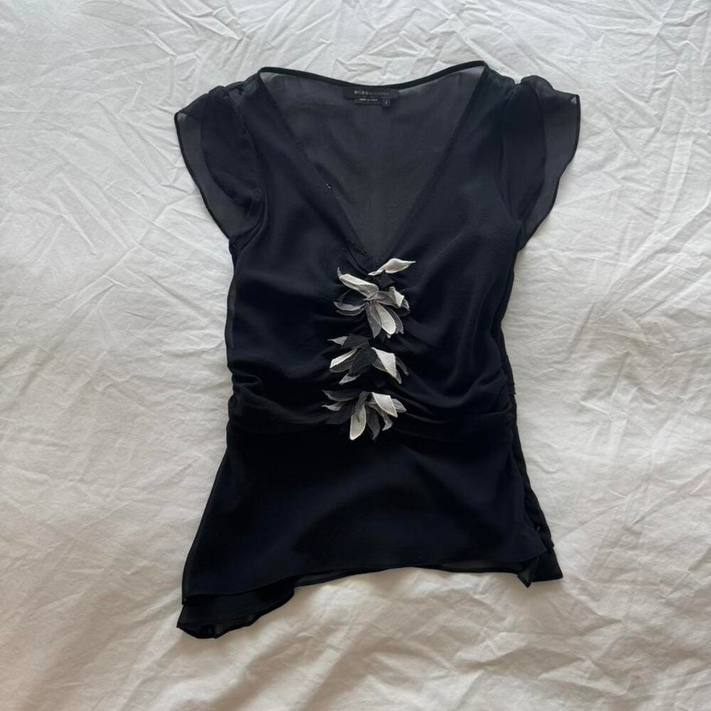 Bcbg black real silk top with silver leaf detailing.